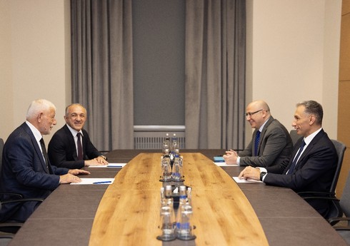 Rəşad Nəbiyev veteran cüdoçu Əhməddin Rəcəbli ilə görüşüb